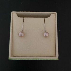 Fanghua rose gold pearl earrings.